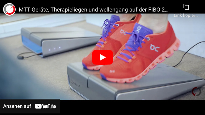Thumbnail eines YouTube Videos. Zeigt ein Paar rote Laufschuhe mit lilane Schnürsenkeln auf einem Traningsgerät.