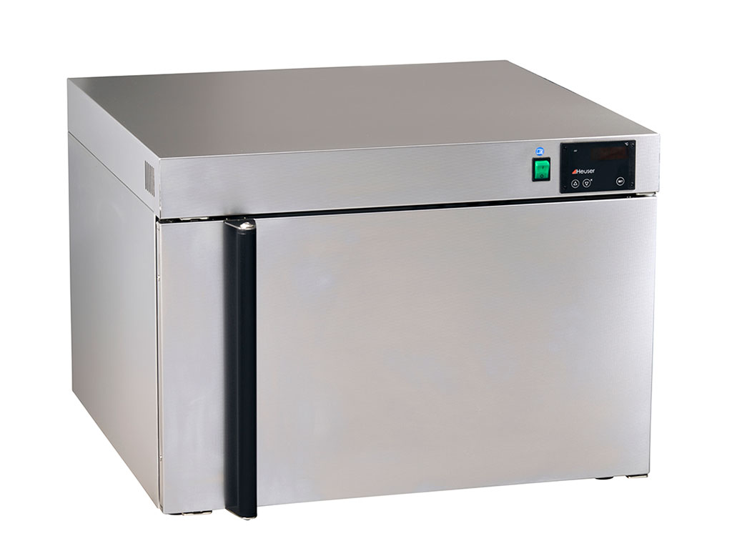 Ein silberner Wärmeschrank 6-6040 zum erwärmen von Fango der Marke Heuser.